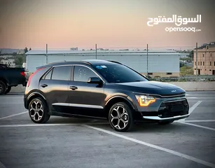  7 كايا نيرو  هايبرد (بنزين+كهرباء ) فل الفل فتحة سقف  /2022 عداد قليل 18000Km