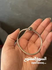  5 اساور باندورا الاصليه فضة و دهبي شامل الفل بكج