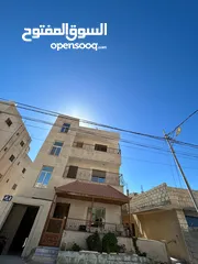  1 شقه طابقيه غير مسكونه للبيع فالكرك منطقه المرج
