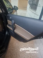  10 مازدا 6 لون اسود متليك