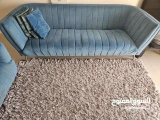  2 Blue 3 seater sofe set + Plus centre Gray Carpet