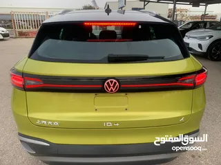  8 Volkswagen ID.4X pure -2021 لون فسفوري مميز فحص كامل