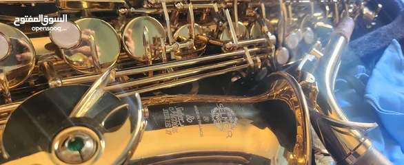  4 ساكسوفون طقريبا جديد بحالة ممتازه مع ستاند و ستراب  Alto Saxophone like new in excellent condition