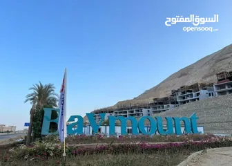  10 *شالية 80 متر للبيع بالعين السخنة متشطب بالمطبخ بقرية BAYMOUNT EL SOKHNA