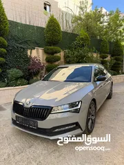  1 سكودا سوبيرب 2021 سبورت لاين 200 حصان  اللون المميز كامل الاضافات عدا فتحه
