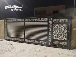 1 تفصيل ابواب وحراسات ودربزينات وبرجولات حسب المقاس والسعر شامل تركيب وتوصيل