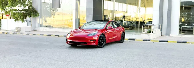  2 تيسلا 2022 model 3 فحص كامل 4 جــيـــد بدون ملاحظات غرفة جلد ابيض لون مميز بحالة الوكالة بسعر لقطة