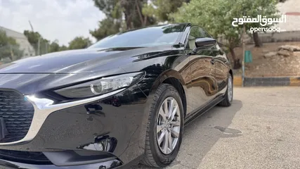  5 مازدا زوم 3 SkyActive مايلد هايبرد 2023 وارد الخياط عداد 43 ألف فقط كرت ابيض