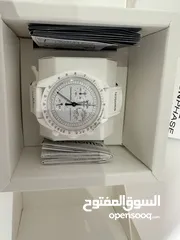  1 Omega Swatch Snoopy White & Black Msg to contact