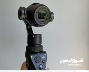  1 Osmo + Zenmuse X3 Zoom بكاميرا ثلاثية المحاور وكاميرا 4K ، وهو مصمم ليتم تثبيته على مقبض D