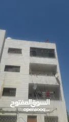  8 شقة طابق ثالث للبيع خلف المستشفى الاسلامي اربد