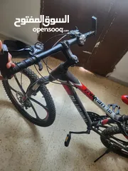  8 بسكليت (دراجه هوائيه) جنط 26 جبلي استعمال خفيف جدا مع هديه سكيت بورد صغير غير مستعمل ابدا