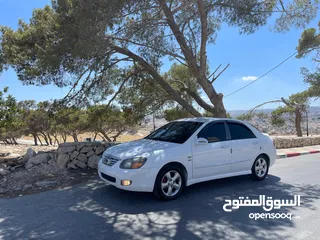  7 كيا سيراتو 2008 ماتور 1600 بنزين اوتومات عدد 2 لون ابيض ولون اسود