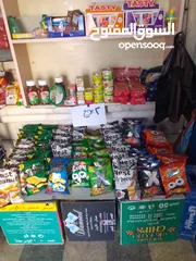  11 بقالة الخال