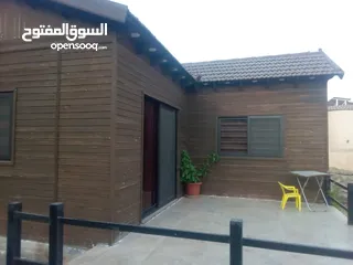  7 كوخ خشبي تصميم اوروبي مفروش اطلاله رائعه السعر 56000 ... من المالك مباشره ...