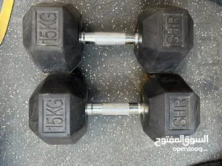  2 دامبل الواحد 15kg وطارات أوزان الوحدة 5 kg