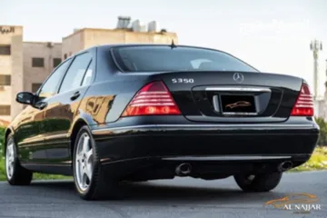  3 مارسيدس s350 موديل 2005 بحالة الوكالة  فحص كامل 4 جيد لون اسود مميز ماتور 3500 cc فحص كامل فل كامل