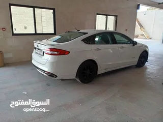  3 فورد فيوجن SE فل كامل فحص كامل مقاعد كهرباء مقاعد جلد فتحه فسقف والعديد من المواصفات سياره ممشى قليل