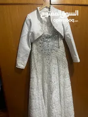  9 فستان عروس أبيض مزين بالشوافريسكي الأصلي