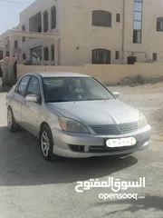  1 ميتسوبيشي لانسر 2009 للبيع Mitsubishi lancer 2009