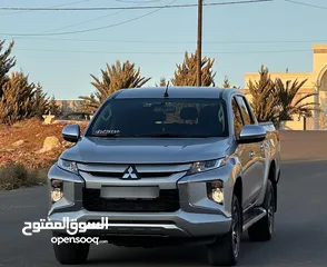  2 ميتسوبيشي L200 2022 لون سلفر مميزه فحص كامل كرت ابيض اتوماتيك ماشيه 54 الف كيلو