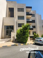  1 شقة ارضية للبيع الدوار الرابع خلف رئاسة الوزراء معفاه من الرسوم