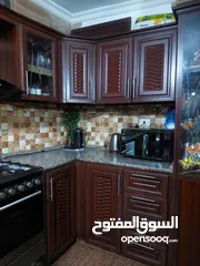  1 شقة أرضية للبيع في منطقة إم نوارة مقابل مدارس النجوم الصاعدة