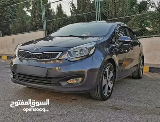  1 كيا ريو بحالة الوكالة فحص كامل مرفق مع الصور