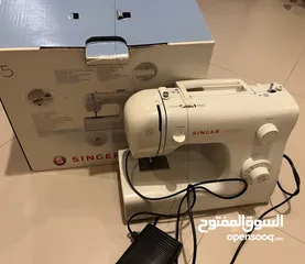  1 Singer sewing machine