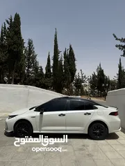  8 تويوتا كورولا 2020 HYBRID، نص فل