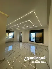  1 بالاقساط في تلاع العلي قرب كلية المجتمع بتشطيب مميز من المالك مباشرة