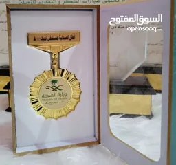  7 أعلام كؤوس وميداليات دروع تفوق وشهادات تقدير