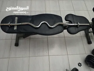  2 بنش شبه جديد  مع اوزان لغابه 70 كيلو