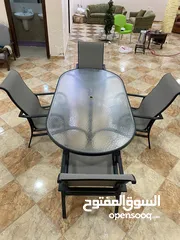  6 طاولة قزاز خارجية مع اربع كراسي