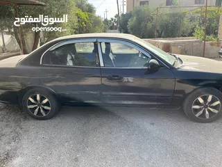  6 كيا اوبتيما 2002
