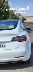  6 Tesla Model 3 Standerd Plus 2022 ابيض وداخليه ابيض جمرك جديد شهر 12‎ بسعر 20 الف بدون الرقم