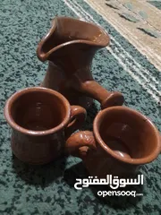  19 صحون كاسات فناجين قرفه شاف غلايه قهوه مع فنجانين فخار للبيع