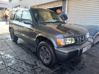  7 كيا سبورتج 2002 بحاله جيده جدا