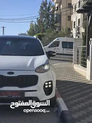  4 سبورتج ماتور 2000 ديزل 4*4 فل اضافات مع بانو راما