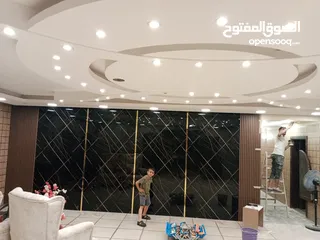  1 ديكورات جبس بورد ودهان وبديل خشب ورخام وشي بورد وكهربا
