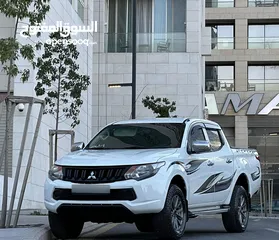 2 ميتسوبيشي L200 2016 لون ابيض مميزه فحص كامل كرت ابيض 7 جيد دفع رباعي 4x4