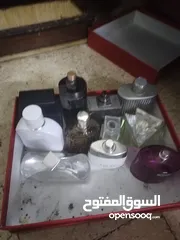  2 علب عطور فاضيه رجاليه او نسائيه