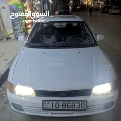  1 متسوبيشي لانسر94 فل ما عدا الجير