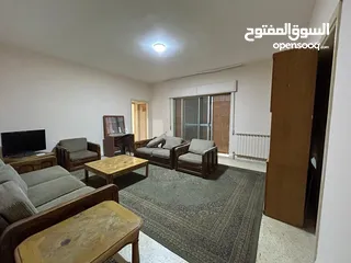  11 شقه 156متر بناء قديم مقابل البوابه الرئيسيه للجامعه الاردنيه تصلح للاستثمار