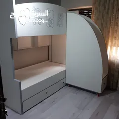  14 تخت طابقين ثلاثي مكفول 5 سنوات بحمل 150 كيلو  الخشب لامنيت مسمك ع خمالتين 3.5 سم
