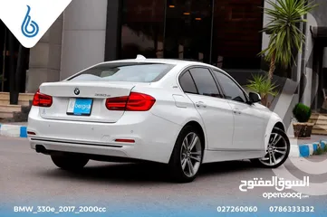  2 BMW_330e_2017_2000cc