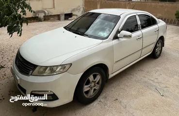  12 كيا اوبتما لوتسي 2009 لون ابيض بحالة جيدة جدا