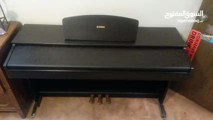  1 Yamaha YDP-121 piano