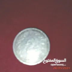  15 قطع نقدية قديمة تونسية وغير تونسية وساعة جيب ألمانية و مغارف سبولة ومفتاح قديم