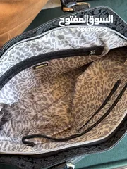  8 شنطة جيس مستعملة للبيع guess